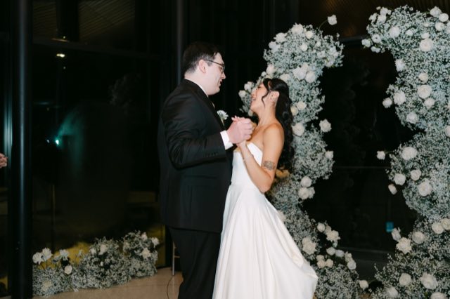 A first dance under warm amber light